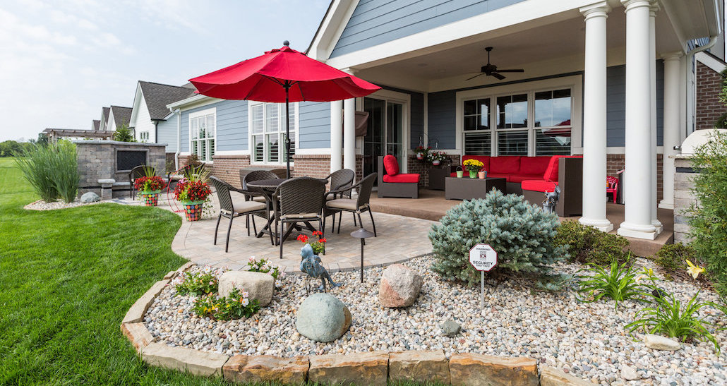 Backyard patio with custom stone edging | Hittle Landscaping