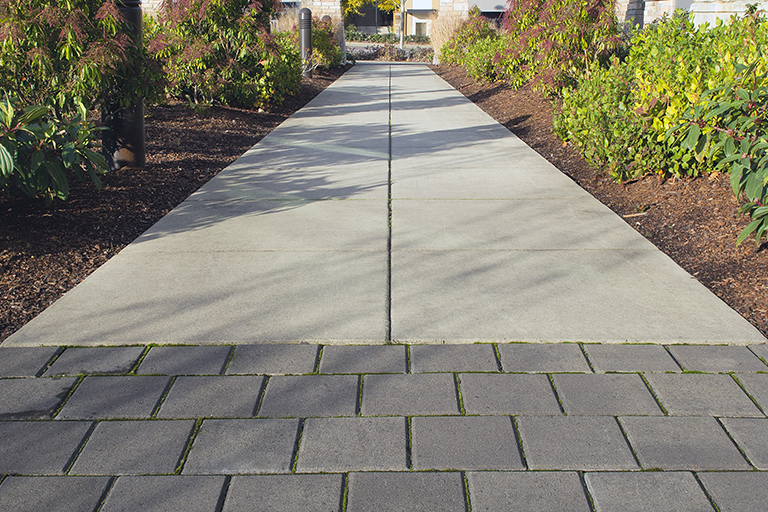 Multiple material sidewalk | Commercial Landscaping Companies Save Money | Hittle Landscaping