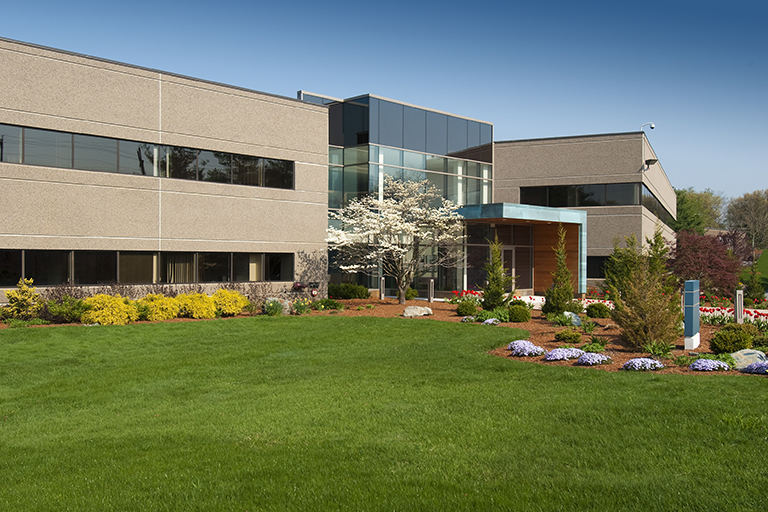 Exterior of commercial landscaped building | Top Commercial Landscaping Tips for Your Business | Hittle Landscaping