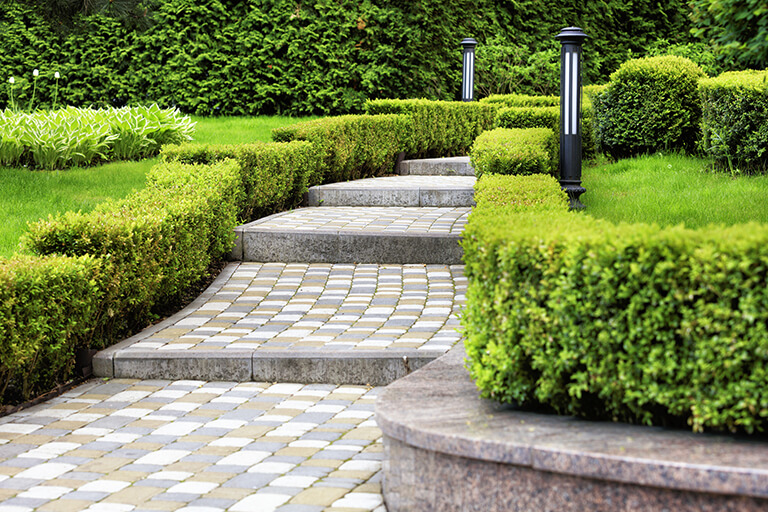 cobblestone walkway | Increase Tenants in Indianapolis with Commercial Landscape Design | Hittle Landscaping